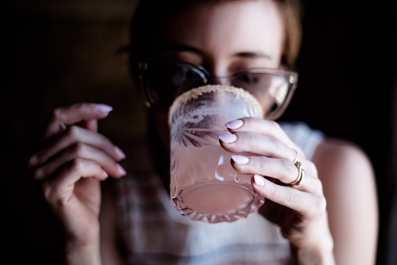 mezcal online lady drinking from Hello Drinks